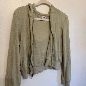 TNA zip up